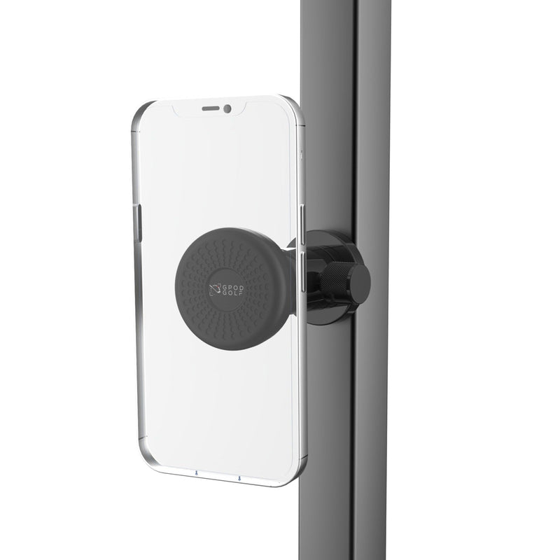 Phone holder with a smartphone attached to a vertical surface on a white background